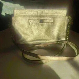 Kate Spade New York Beacon Court Angelica Patent Leather Crossbody in Gold